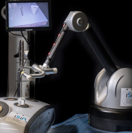 Surgical robot holding a laparoscopic tool
